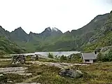 View of the western shore of Lake Ågvatnet with the peaks of Mannen and Gjerdtindal