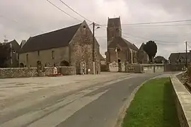 The church and surroundings in Émondeville