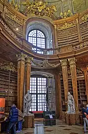 Stylized Baroque Corinthian columns in the Austrian National Library, Hofburg, Vienna, Austria, designed by Johann Bernhard Fischer von Erlach in c.1716–1720, built in 1723–1726