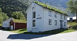 The municipal council of Øksendal used to assemble in this house at Øksendalsøra.