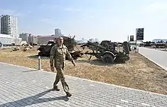 Ilham Aliyev in front of the seized equipment