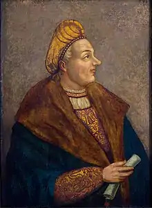 Portrait of a man in profile, holding a parchment