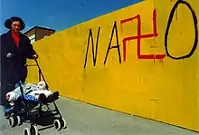 Anti-NATO graffiti on a wall during the NATO bombing of Novi Sad in 1999