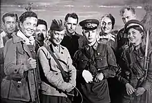 During the filming of Fighting Film Collection #4 in August 1941. Orlova is standing next to Viktor Talalikhin.