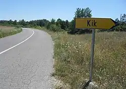 A sign at the entrance to the village Kik