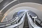 Bottom of the escalators
