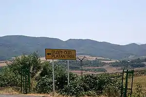 A sign towards Tnjri, a 2000-year old plane-tree near Skhtorashen