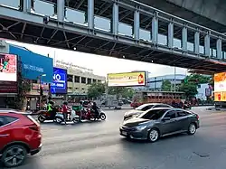Ekkamai Tai Junction, where Ekkamai combines Sukhumvit Roads opposite Bangkok Eastern Bus Terminal,  Ekkamai Road (Soi Sukhumvit 63) formed a boundary between Khlong Tan Nuea and Phra Khanong Nuea.