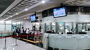Airport Terminal 2 faregates and information booth