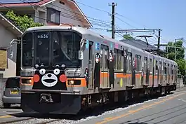 A passenger train between Fujisakigu-mae and Kurokamimachi stations.