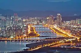 Twilight view of Taehwa River and downtown area