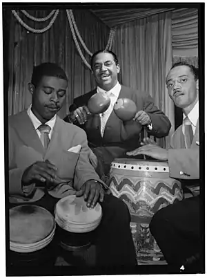 José Mangual Sr. on bongos (left) alongside Machito on maracas and Carlos Vidal on conga at the Glen Island Casino, New York, 1947