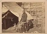 Photograph taken about 1862 of a contraband servant named John Henry in a Union Army Camp.