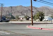 A Mountain Monogram "T" sits on the hills above Trona.