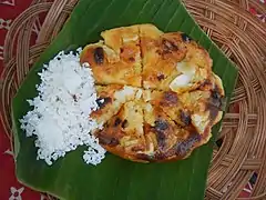 Bibingka from Baliwag topped with salted duck eggs and grated coconut