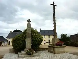 The calvary, the war memorial and the town hall in Bolazec