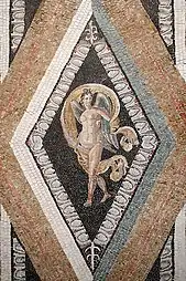 Roman mosaic with an egg-and-dart border, that depicts the Ancient Greek goddess Nike