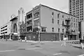 100 block of Monroe from Farmer Street with the Royal Theater (originally the Star) at 100-102 Monroe in the foreground, 1989.