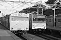 JNR 103 & 205 series Yamanote Line meet at Uguisudani station, February 1986
