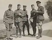 77th Division commander and brigade commanders conversing in France, 1918. National Archives and Records Administration.