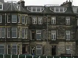 The clubhouses of The St Rule Club (left) and St Andrews Golf Club (right)