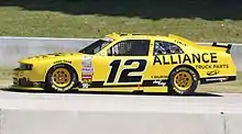 Yellow-and-black race car