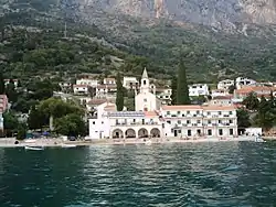 Seaside view of Brist with Hotel Riva and the Church of St. Margaret the Martyr, patron saint