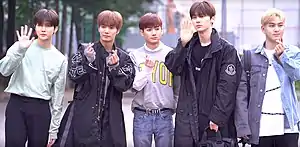 NU'EST in May 2019From left to right: Ren, JR, Aron, Minhyun, and Baekho