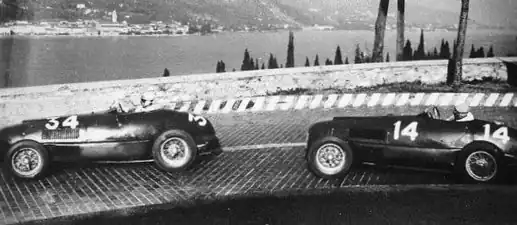 Two Ferrari 166 at Circuito del Garda outside Salò in northern Italy on 24 Ottobre 1948. To the left (entry #34) is the 1948 Ferrari 166 SC s/n 018i driven by its owner Bruno Sterzi (got 2nd place), and on the right (entry #14) is the 1948 Ferrari 166 SC s/n 008i (aka "Ansaloni Spider Corsa SWB") driven by Ferdinando Righetti and/or Clemente Biondetti (became 6th overall).