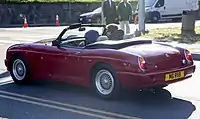 Rear view of the MG RV8, unusual in Flame Red