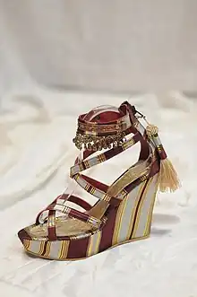 An example of a  high wedge-heeled sandal