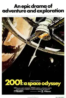 A painted image of a space station suspended in space, in the background the Earth is visible. Above the image appears "An epic drama of adventure and exploration" in blue block letters against a white background. Below the image in a black band, the title "2001: a space odyssey" appears in yellow block letters.