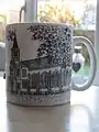 The front of the mug features the original building designed by Decimus Burton