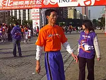 Hsu Gi-sheng, long-distance running club & school team coach of NTUS