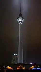 TV tower, lit up at night