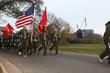 James T. Conway leads a unit run of Marines in 2009.