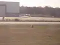 Detail view of crash location at northwest corner of US Airways hangar at Charlotte Douglas International Airport viewed from Runway 5.