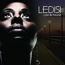 A close-up image of Ledisi's face and a boardwalk with light poles.