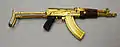 Gold plated assault rifle built by Tabuk in Iraq to the specifications of the AKMS.