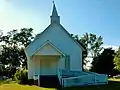 The New Hope Baptist Church was originally constituted in 1860 and moved to present building in 1901.