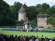 The windmill at the Hippodrome de Longchamp is a vestige of the old Abbey of Longchamp, destroyed after the French Revolution.