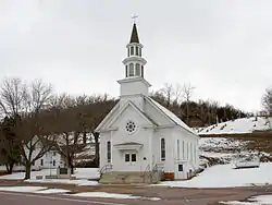 The Church of St. Thomas was built in 1870 as focal point of state's oldest Irish farming settlement, established in the 1850s, and is listed on the National Register of Historic Places.