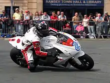 2013 Isle of Man TT  TT Zero Practice Session Mark Miller (2) MotoCzysz E1pc at Parliament Square, Ramsey 3 June 2013.