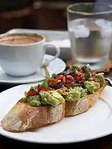 Image 181Avocado salad, tomato and salsa on a toasted baguette. (from 2010s in culture)