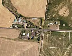 2016 aerial photo of Lamoine.  White square in bottom right corner represents original town site of Arup.  Lamoine schoolhouse is visible in upper right corner of square.