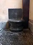 Lavabo and ledger stone