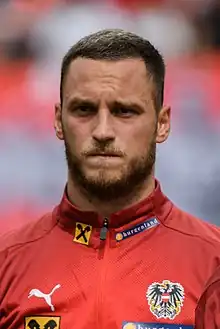 A headshot of a footballer