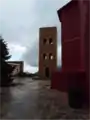 Upper courtyard and bell tower of Panayia Yiatrissa, facing southeast toward the Laconian Gulf.