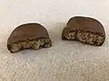 A Reese's Peanut Butter Pumpkin split in half