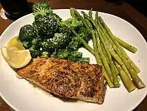 Herb-grilled salmon with side of asparagus and broccoli
